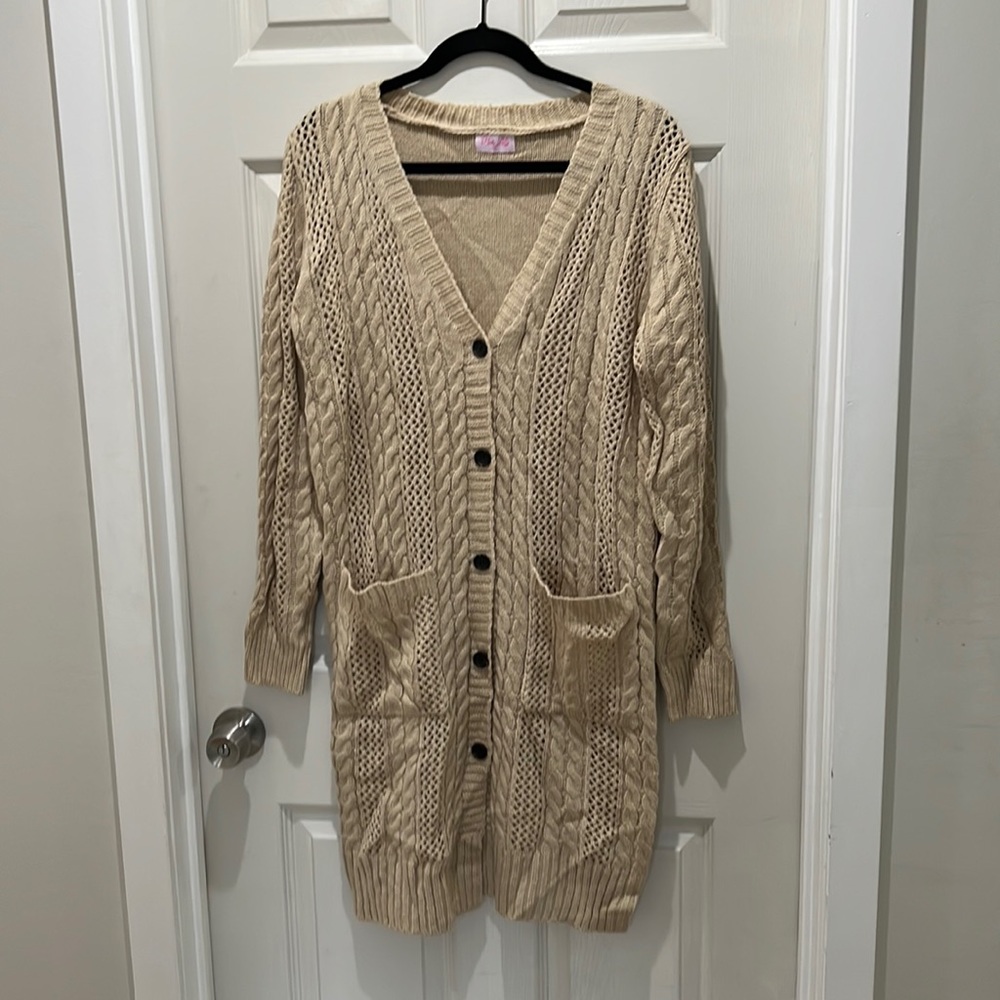 Brand mew Pink Lily cardigan.